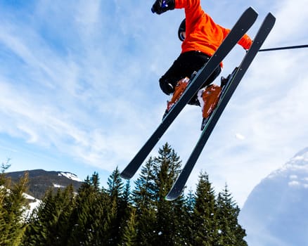 Skiers in the jump