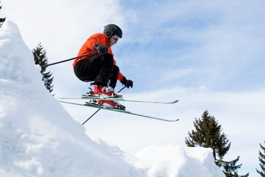 Skiers in the jump