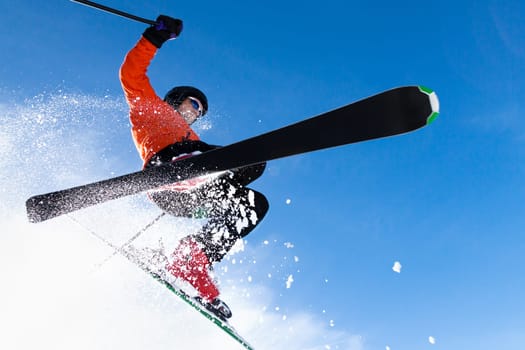 Skiers in the jump