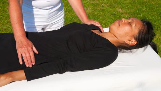 Polarity massage  a technique of gently rocking, holding and massaging to stimulate relaxation, restore energy flow and encourage revitalization