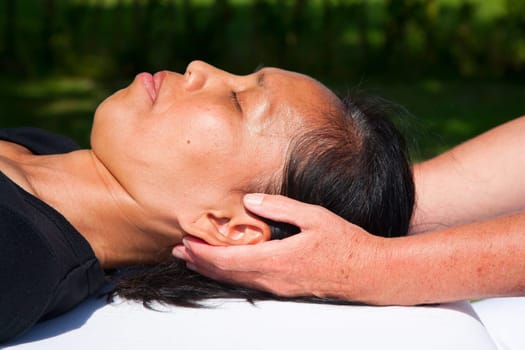 Polarity massage  a technique of gently rocking, holding and massaging to stimulate relaxation, restore energy flow and encourage revitalization
