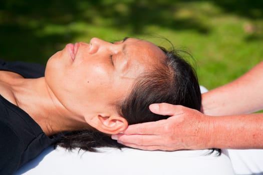 Polarity massage  a technique of gently rocking, holding and massaging to stimulate relaxation, restore energy flow and encourage revitalization
