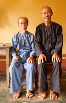 Vietnamese monks in the Phi Lai temple in Ba Chuc, Mekong Delta, Vietnam