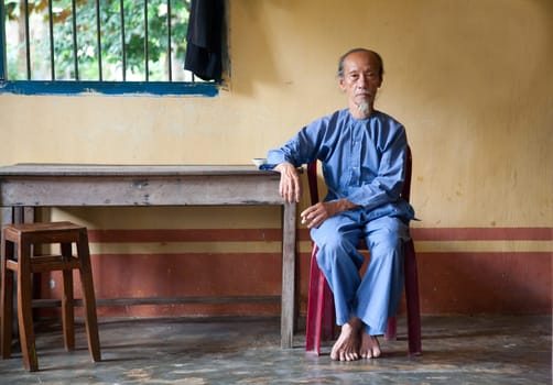 Vietnamese monk in the Phi Lai temple in Ba Chuc, Mekong Delta, Vietnam
