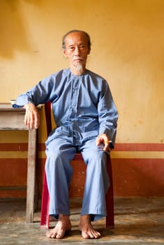 Vietnamese monk in the Phi Lai temple in Ba Chuc, Mekong Delta, Vietnam