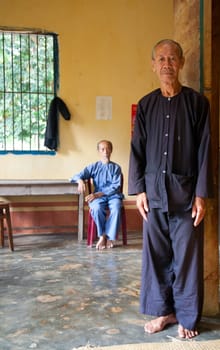 Vietnamese monks in the Phi Lai temple in Ba Chuc, Mekong Delta, Vietnam