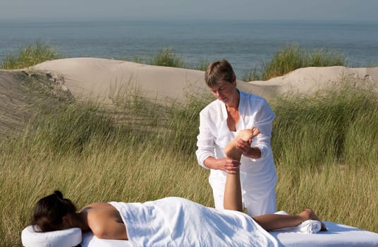 Massage in the dunes on the island Ameland, the Netherlands