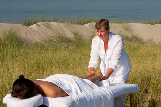 Massage in the dunes on the island Ameland, the Netherlands