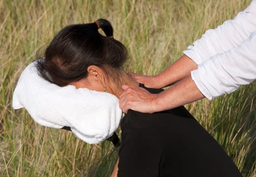 Chair massage in the dunes on the island Ameland, the Netherlands