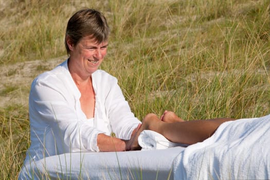 Massage in the dunes on the island Ameland, the Netherlands