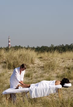 Massage in the dunes on the island Ameland, the Netherlands