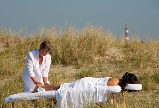 Massage in the dunes on the island Ameland, the Netherlands