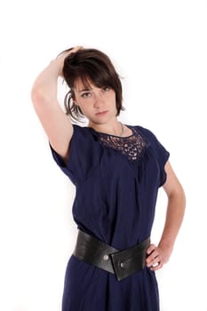young brunettte woman playing like a model isolated on studio