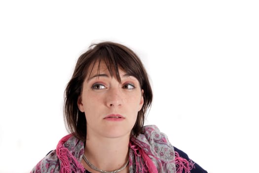 portrait of a young brunette woman with colored scarf looking ahead