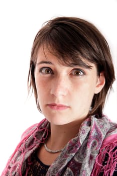 portrait of a young brunette woman with colored scarf looking ahead