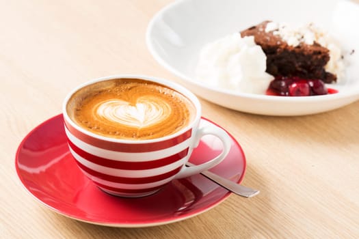 Cup of cappuccino with heart illustration from foam