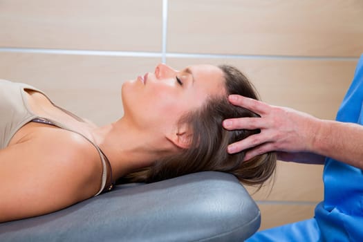 Massage therapy on cranial hear area by therapist to a beautiful woman