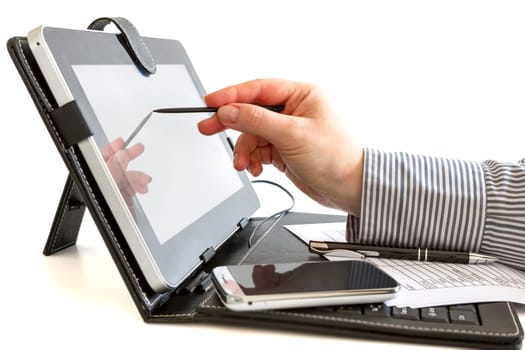 Business woman hand typing on touch screen of digital tablet