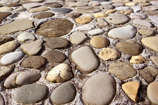 a wall texture stone shaped pebbles in concrete