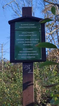 October 17 2024 Hrensko Czech Republic Europe Park warning sign summer day travel nature trees sky . High quality photo
