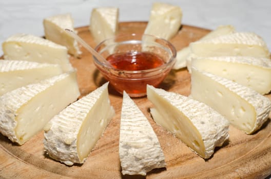 fresh cheese slices with rose jam