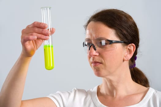 woman in laboratory with test tube
