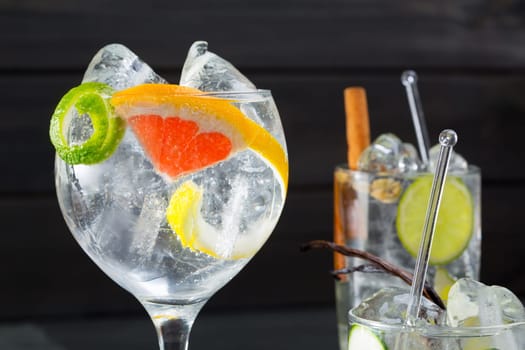 Gin tonic varied cocktails with lima lemon and grapefruit vanilla and cinnamon spices