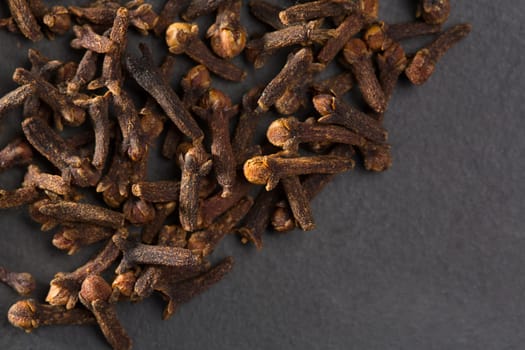 Cloves spice macro closeup on black background