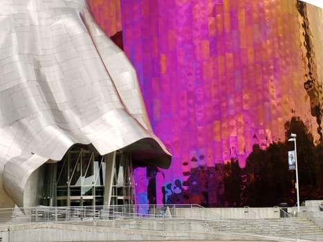 SEATTLE - SEPTEMBER 6: Experience Music Project (EMP) with Seattle monorail running through on September 6, 2011. EMP was designed by Frank Gehry and houses many rare artifacts from popular music history.