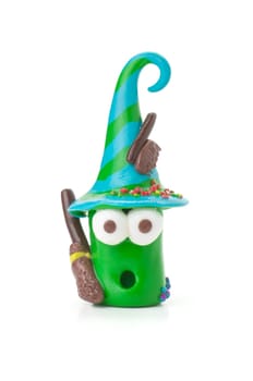Handmade clay figure with broom