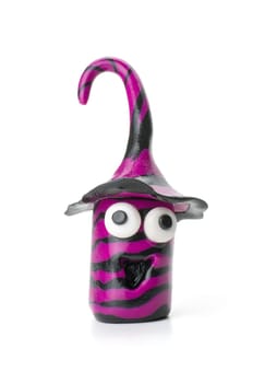 Handmade clay figure with black-violet stripes