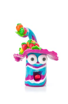 Handmade clay figure with fruits