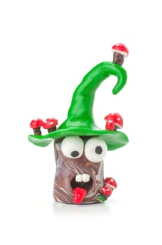 Handmade clay figure with toadstools