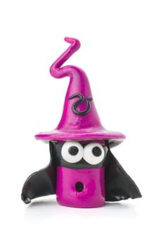Handmade clay figure with cape and mask