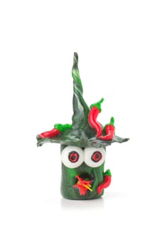 Handmade clay figure with chilies