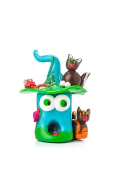 Handmade clay figure with cats