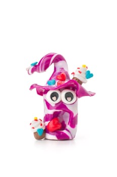 Handmade clay figure with sweets