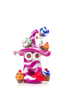 Handmade clay figure with sweets