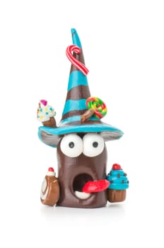 Handmade clay figure with sweets