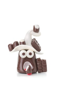 Handmade clay figure with chocolate
