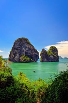 Tropical island and sea view with boat, Andaman sea, Krabi, Thailand