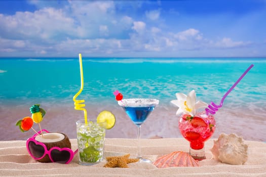 beach tropical cocktails on white sand mojito blue hawaii on white sand