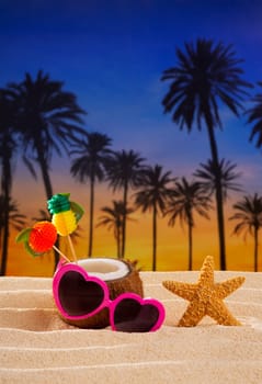 Coconut cocktail on tropical white sand beach heart shape funny sunglasses