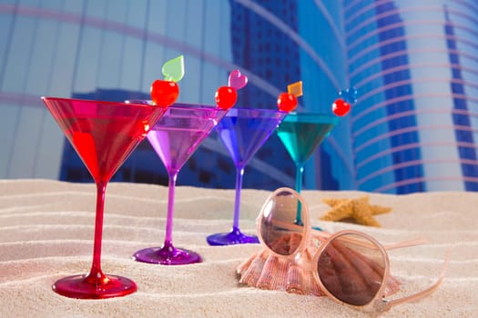 colorful cocktail in a row with cherry sand in urban city building