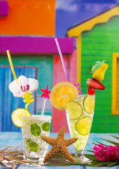 Mojito and lemon lime Cocktails in tropical blue wood in cuban mexican colorful house