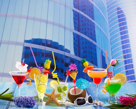 Colorful many tropical Cocktails in urban city building with coconut mojito pepermint margarita