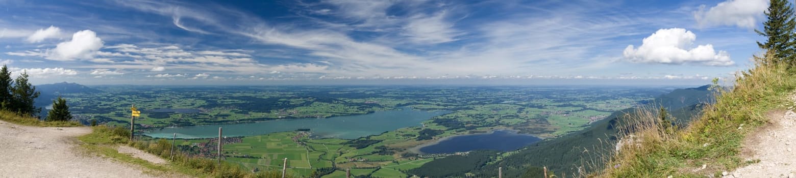 Allgäu panorama with view from Tegelberg to the Foggensee and Bannwaldsee in the Schwangau / Bavaria  Panorama of Allgäu look from Tegelberg to the Foggensee and Bannwaldsee in the Schwangau / Bavaria (panoramic composed from multiple images)