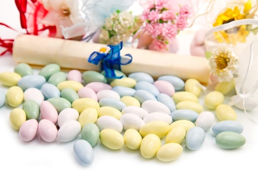 different colored candy favor on white background