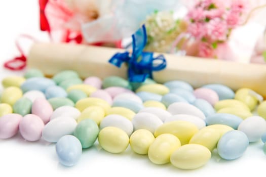 different colored candy favor on white background