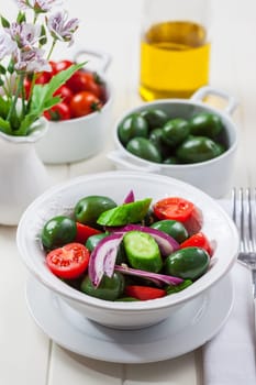Greek salad with fresh green olives